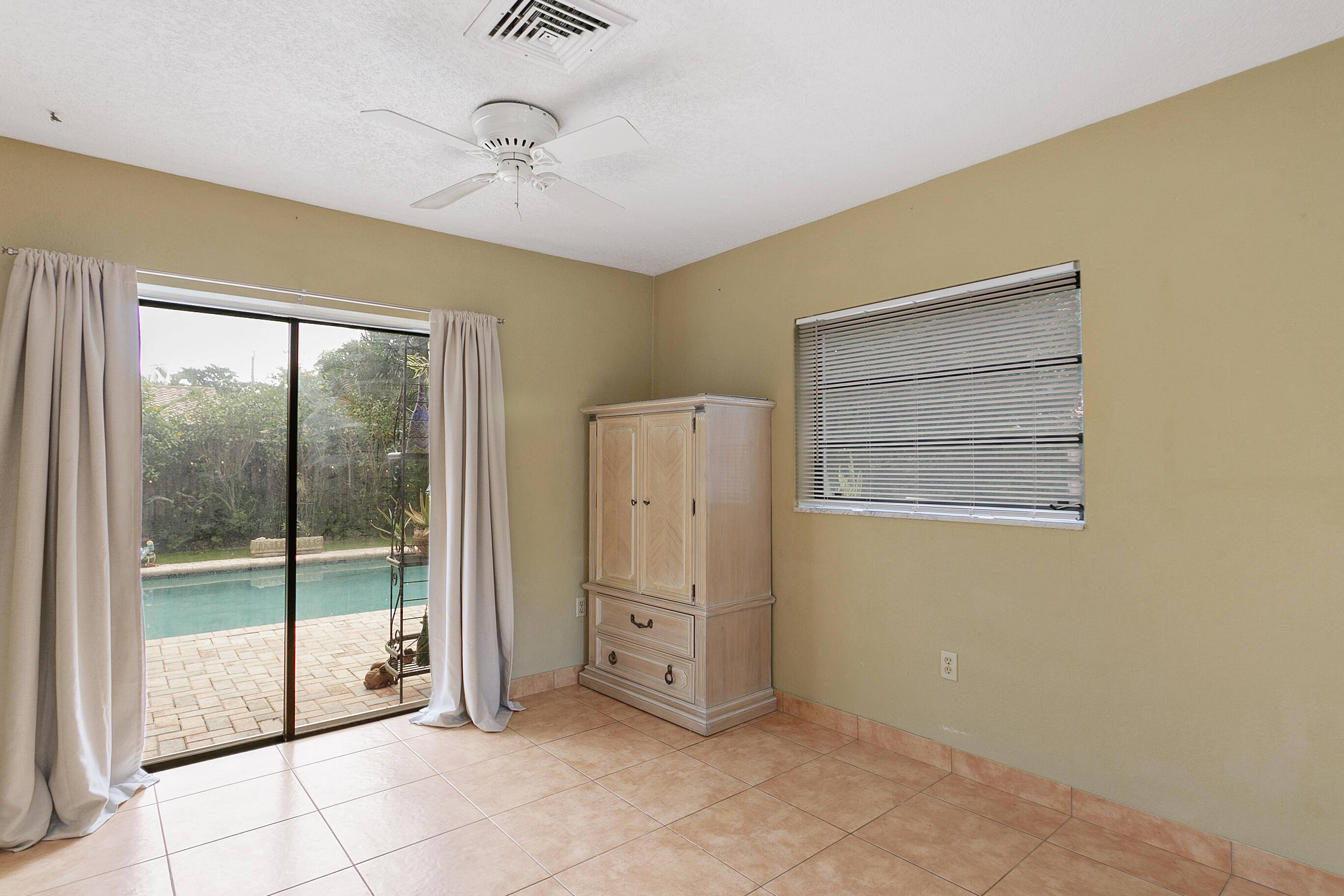 784 Northwest 7th Street Boca Raton, FL 33486 - Photo 11 of 11 a view of an empty room with a window