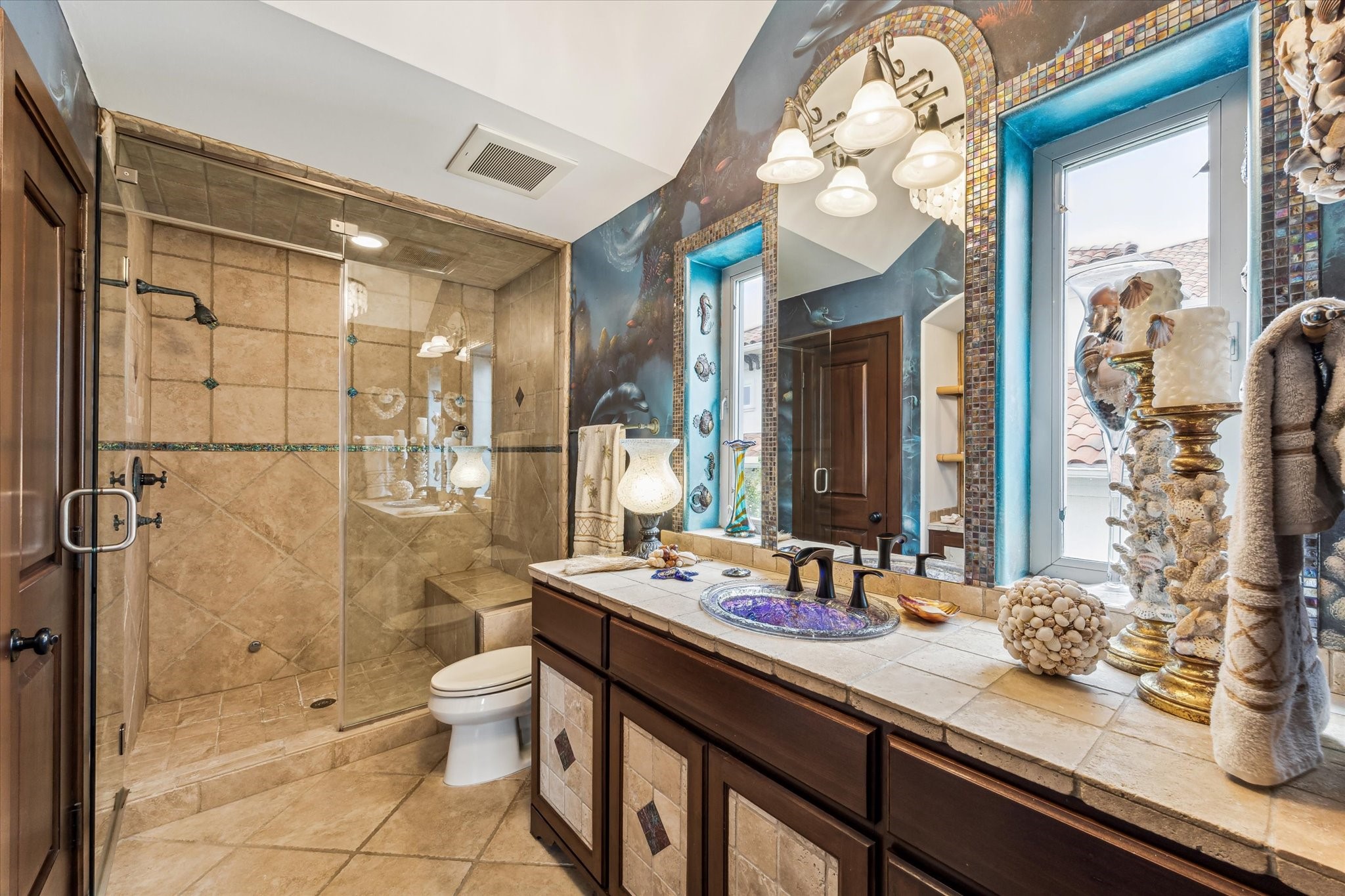 1818 Ray Shell Court Seabrook, TX 77586 - Photo 28 of 50 a bathroom with a granite countertop sink toilet a mirror and shower
