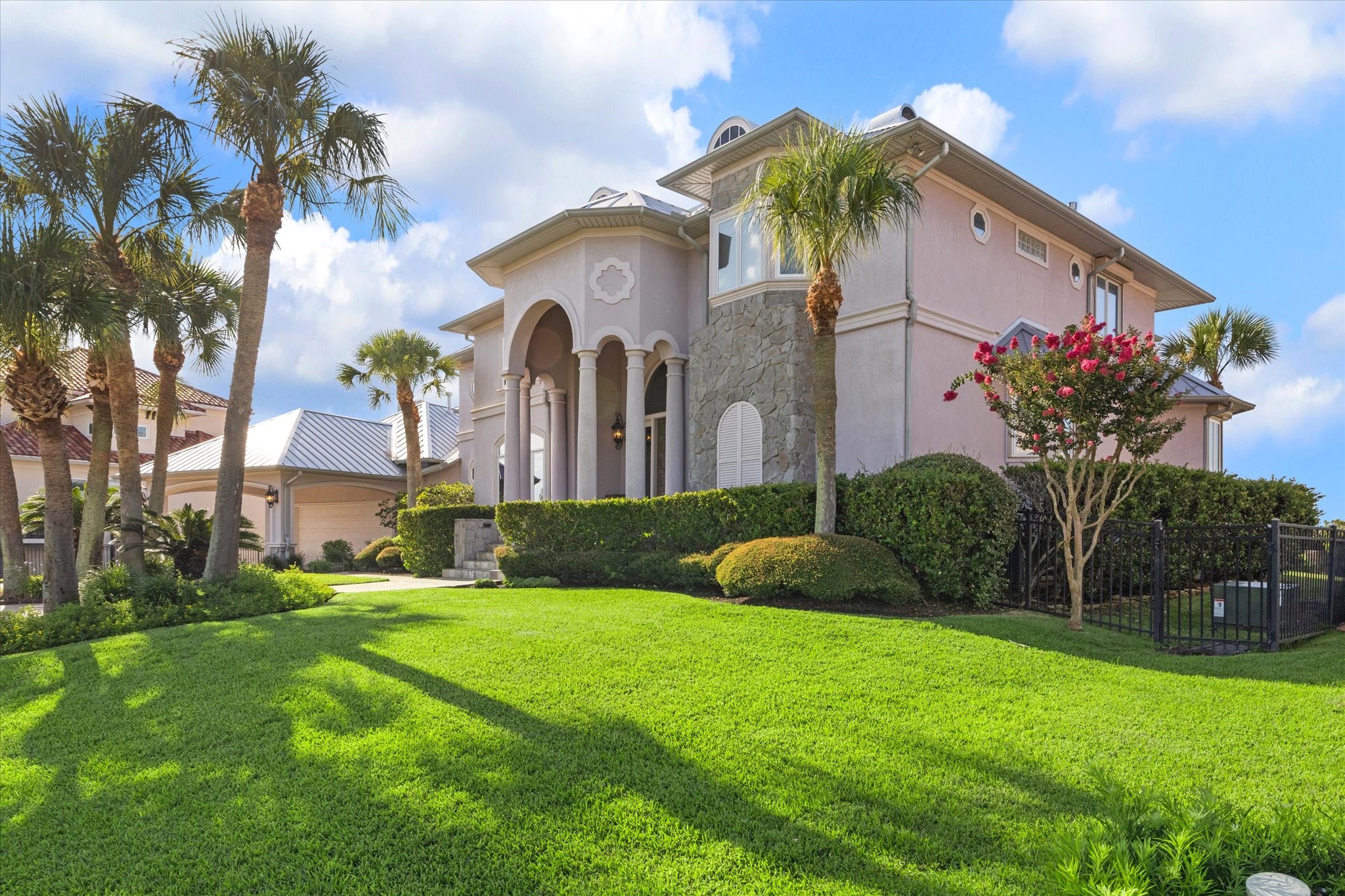 1818 Ray Shell Court Seabrook, TX 77586 - Photo 5 of 50 a view of a white house with a big yard and a large trees