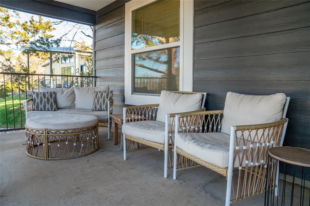 1782 Fm 2951, Unit 2 Graford, TX 76449 - Photo 15 of 21 a living room with furniture and a floor to ceiling window