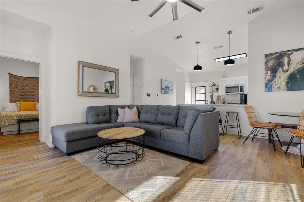 1782 Fm 2951, Unit 2 Graford, TX 76449 - Photo 7 of 21 a living room with furniture and a wooden floor