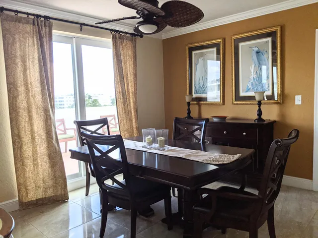 a view of a workspace with furniture and wooden floor
