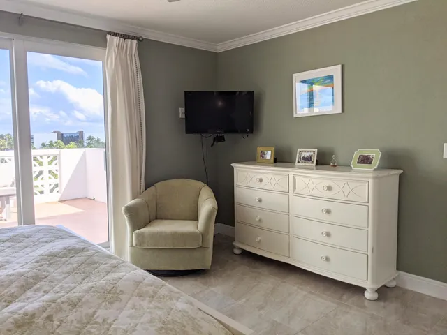 a bedroom with a bed and a table in it