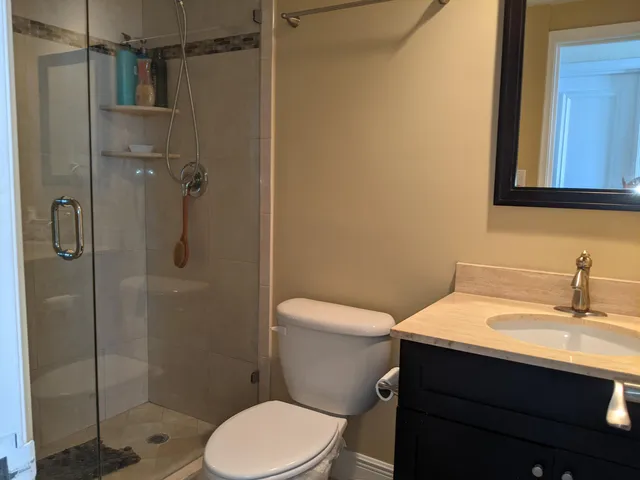 a view of a lake with a house