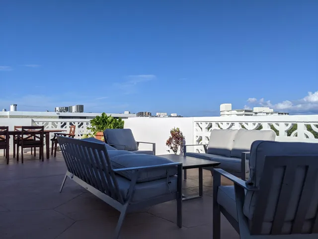 a living room with furniture and a couch