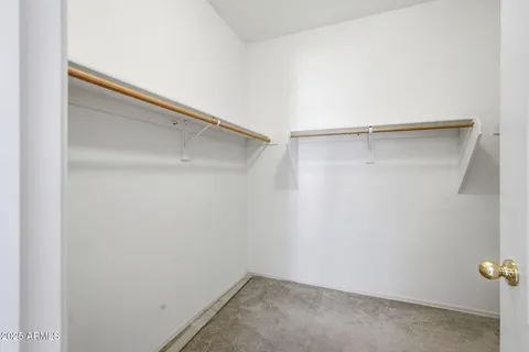 a bathroom with a double vanity sink mirror and
