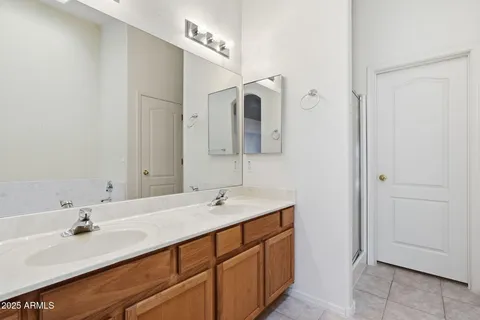 a white bath tub and shower