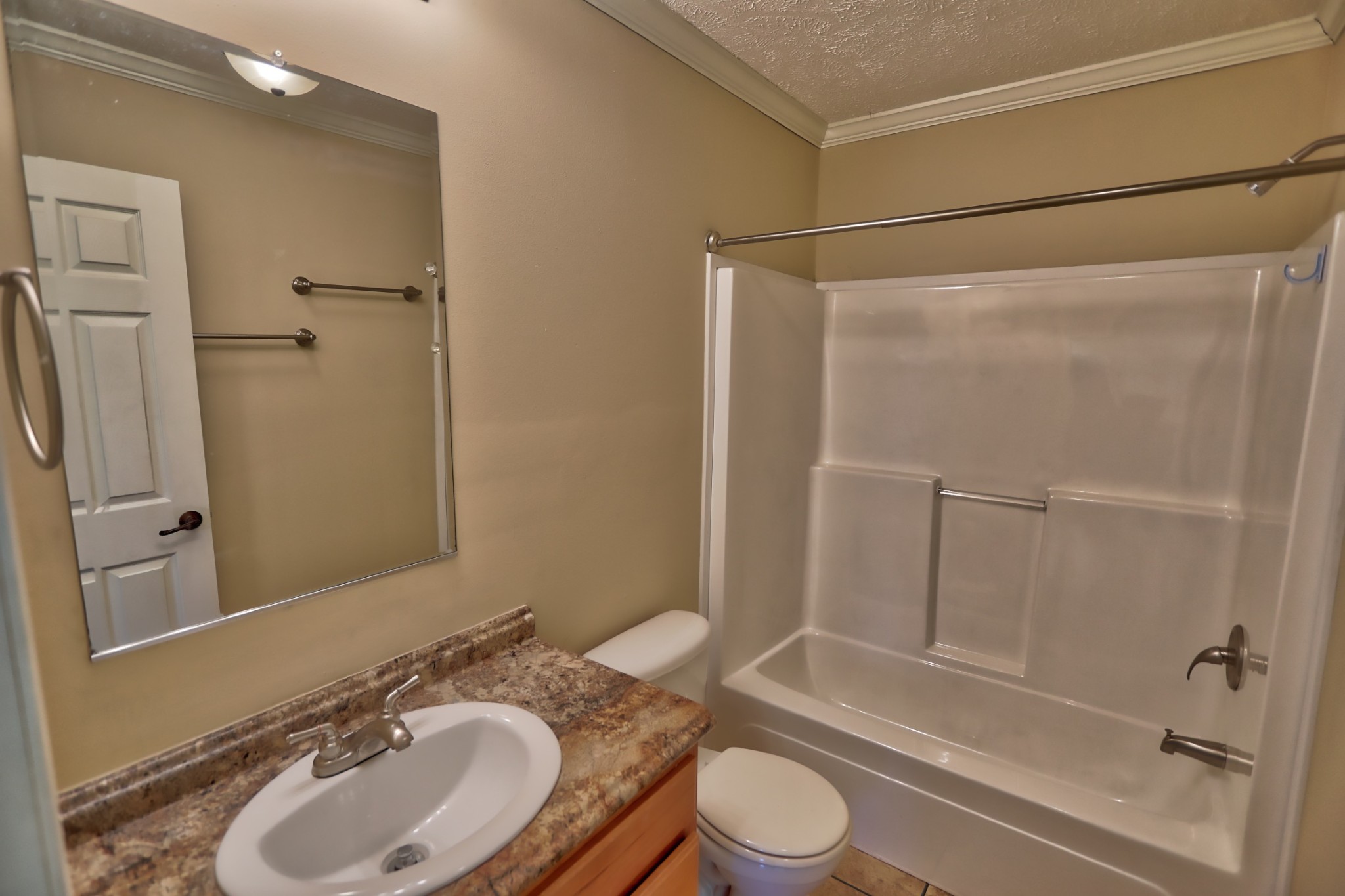 7438 Chowning Road Springfield, TN 37172 - Photo 32 of 33 a bathroom with a granite countertop sink toilet and shower