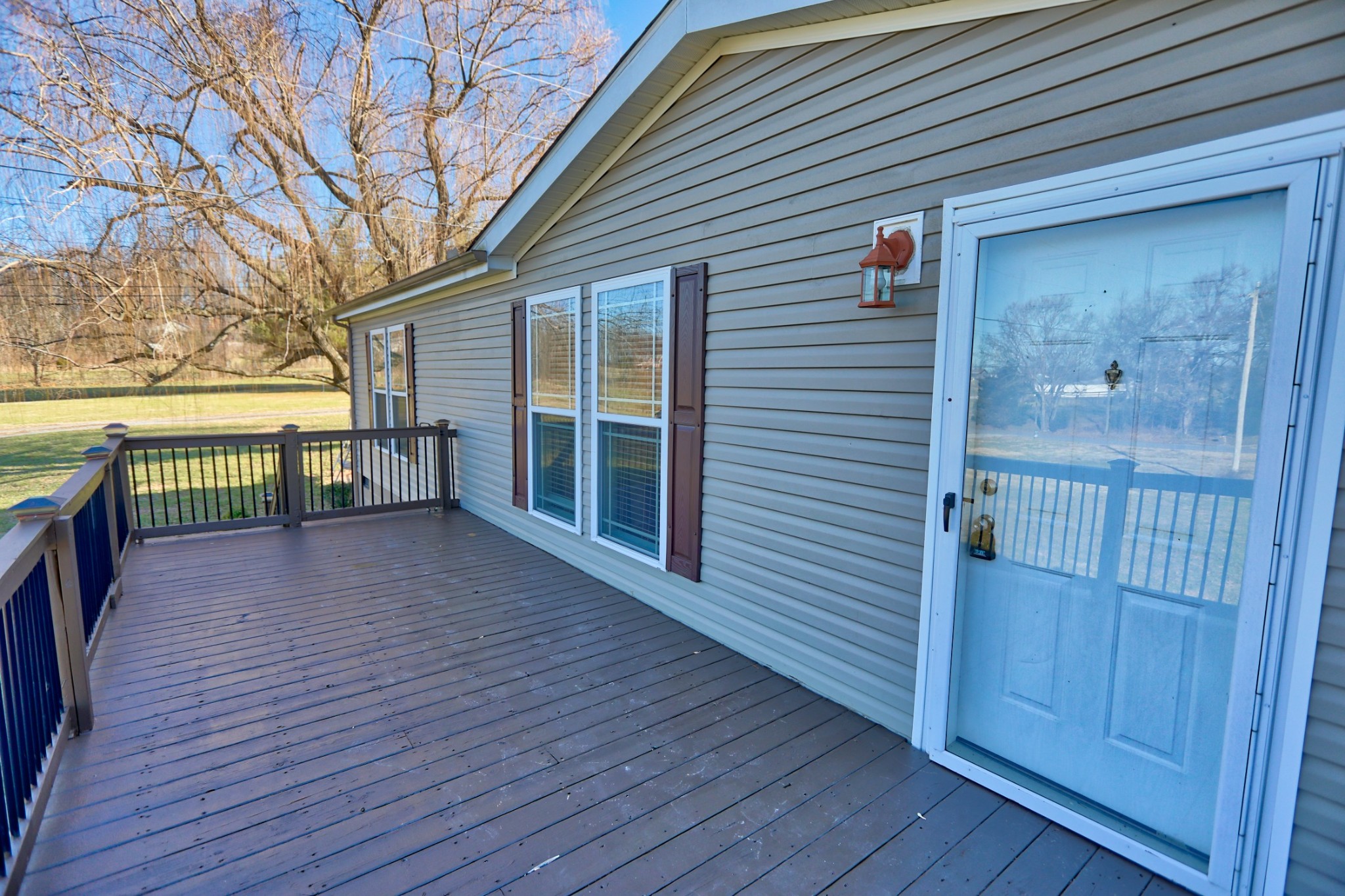 7438 Chowning Road Springfield, TN 37172 - Photo 7 of 33 a view of outdoor space with wooden floor and windows