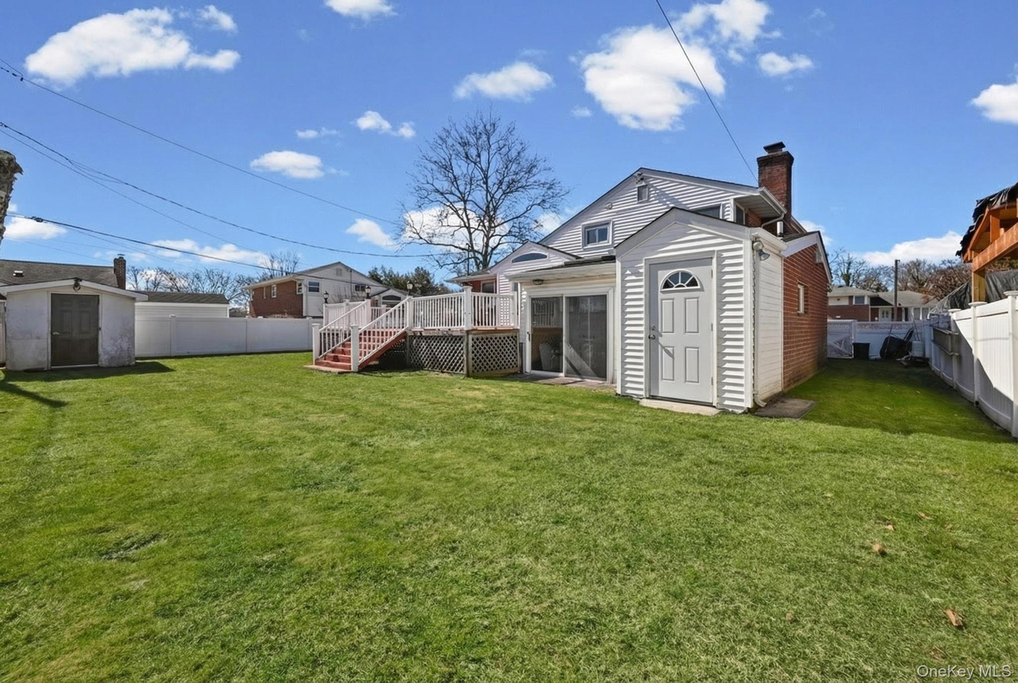 3 Chapin Road Farmingdale, NY 11735 - Photo 3 of 26 a view of a house with a yard