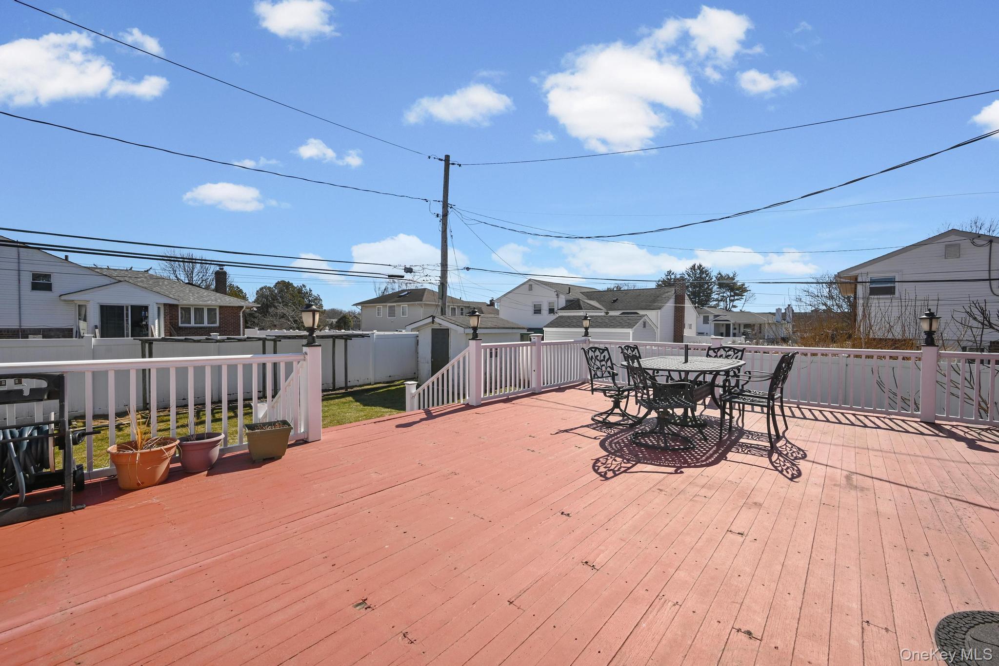 3 Chapin Road Farmingdale, NY 11735 - Photo 5 of 26 a view of a patio with a table and chairs