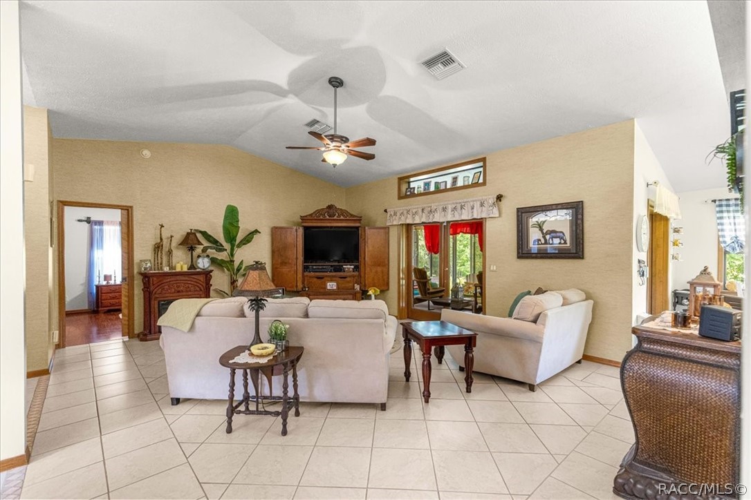 2964 South Cygnet Terrace Inverness, FL 34450 - Photo 6 of 67 a living room with furniture and a flat screen tv
