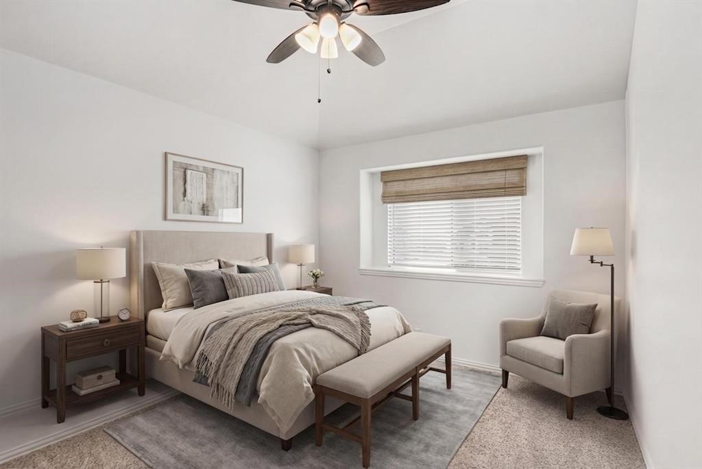 303 Pineview Lane Ponder, TX 76259 - Photo 11 of 19 a bedroom with a bed and a chandelier