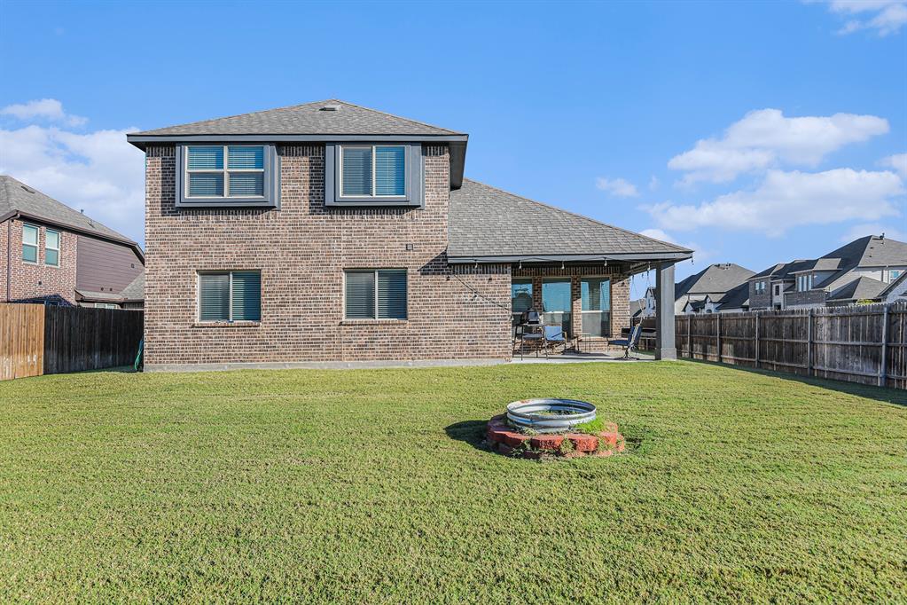 303 Pineview Lane Ponder, TX 76259 - Photo 18 of 19 a front view of a house with a yard