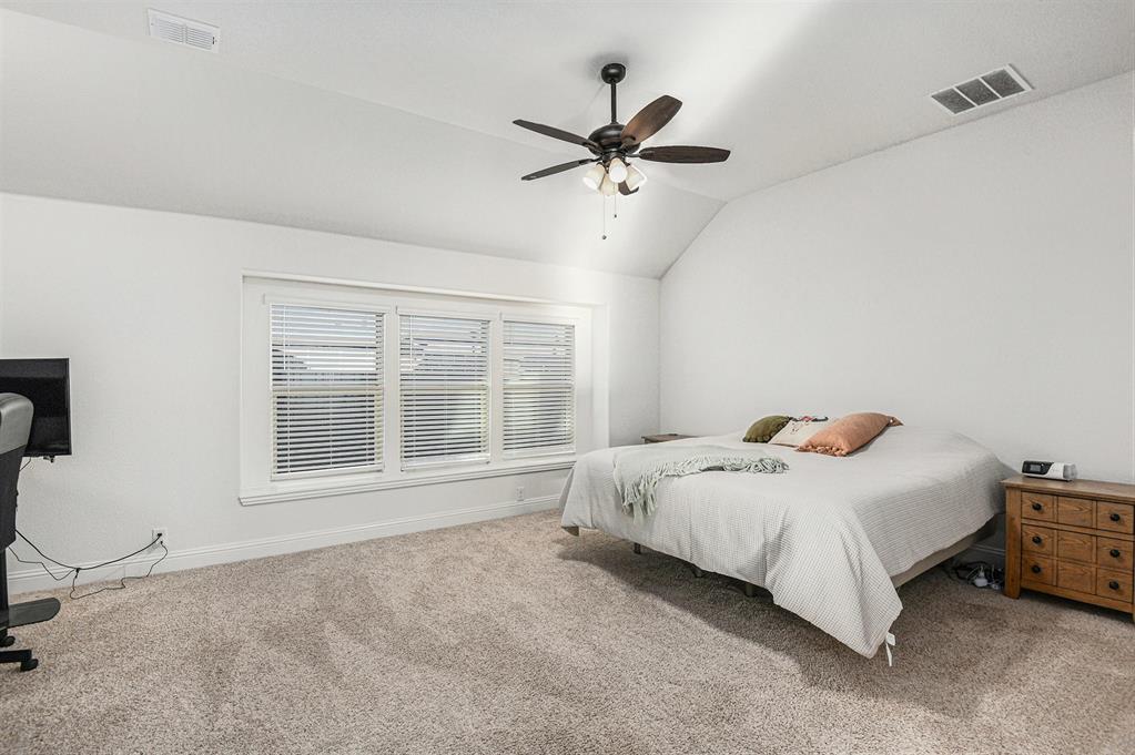 303 Pineview Lane Ponder, TX 76259 - Photo 6 of 19 a bedroom with a bed and a window