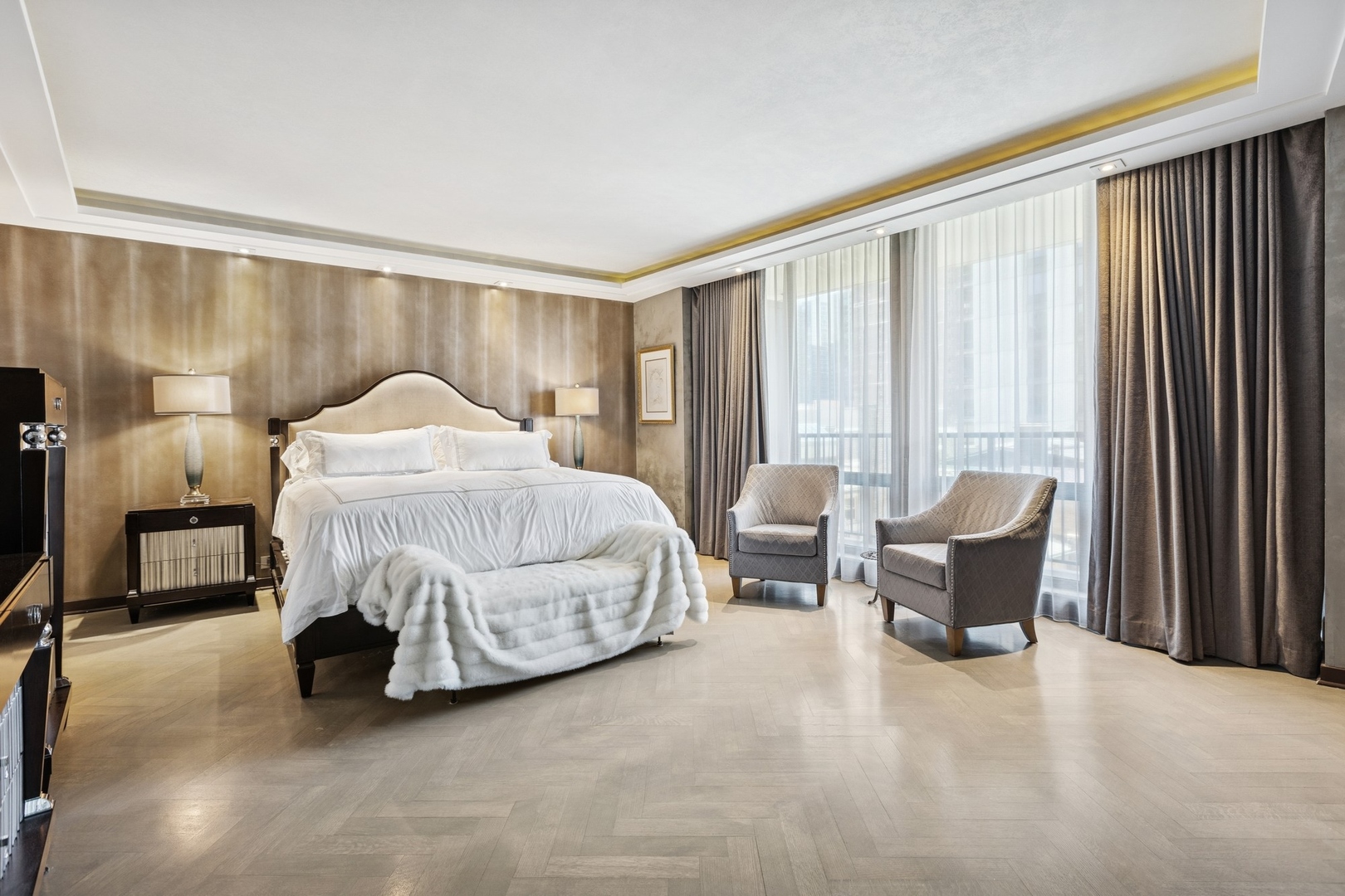 1040 North Lake Shore Drive, Unit 7C Chicago, IL 60611 - Photo 16 of 37 a bedroom with a bed chair and lamp