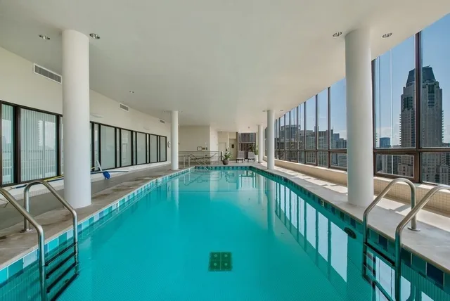 a view of a house with swimming pool