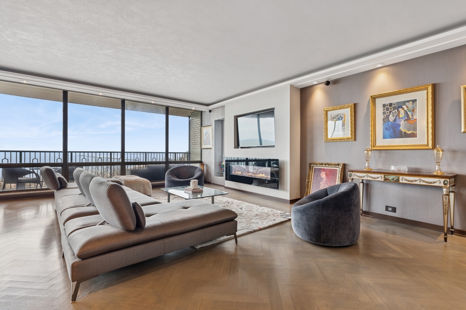 1040 North Lake Shore Drive, Unit 7C Chicago, IL 60611 - Photo 5 of 37 a living room with furniture and a fireplace