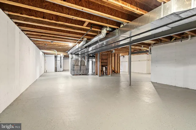 a view of a room with wooden walls