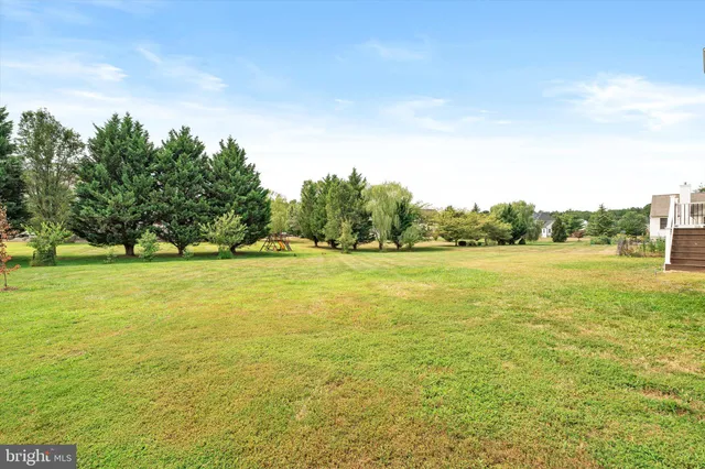 a view of an ocean and a yard