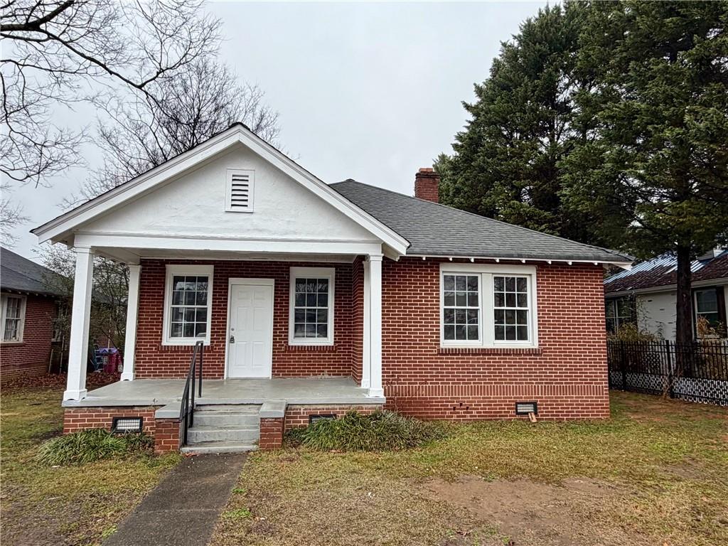 696 Goodyear Avenue Rockmart, GA 30153 - Photo 1 of 9 a view of front of a house with a yard