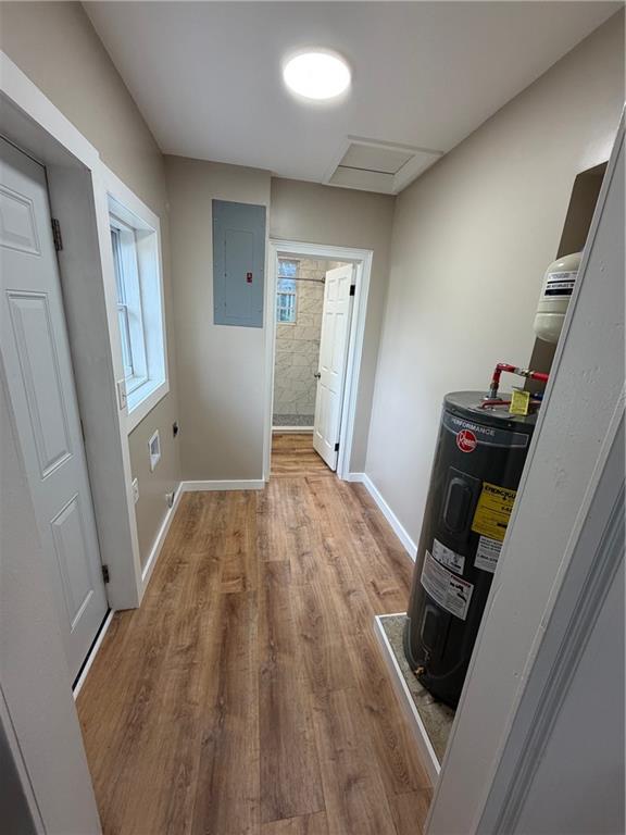 696 Goodyear Avenue Rockmart, GA 30153 - Photo 9 of 9 a view of a hallway to a livingroom with wooden floor and staircase