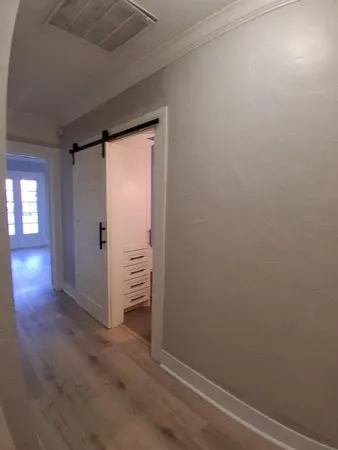 a bathroom with a shower curtain and sink