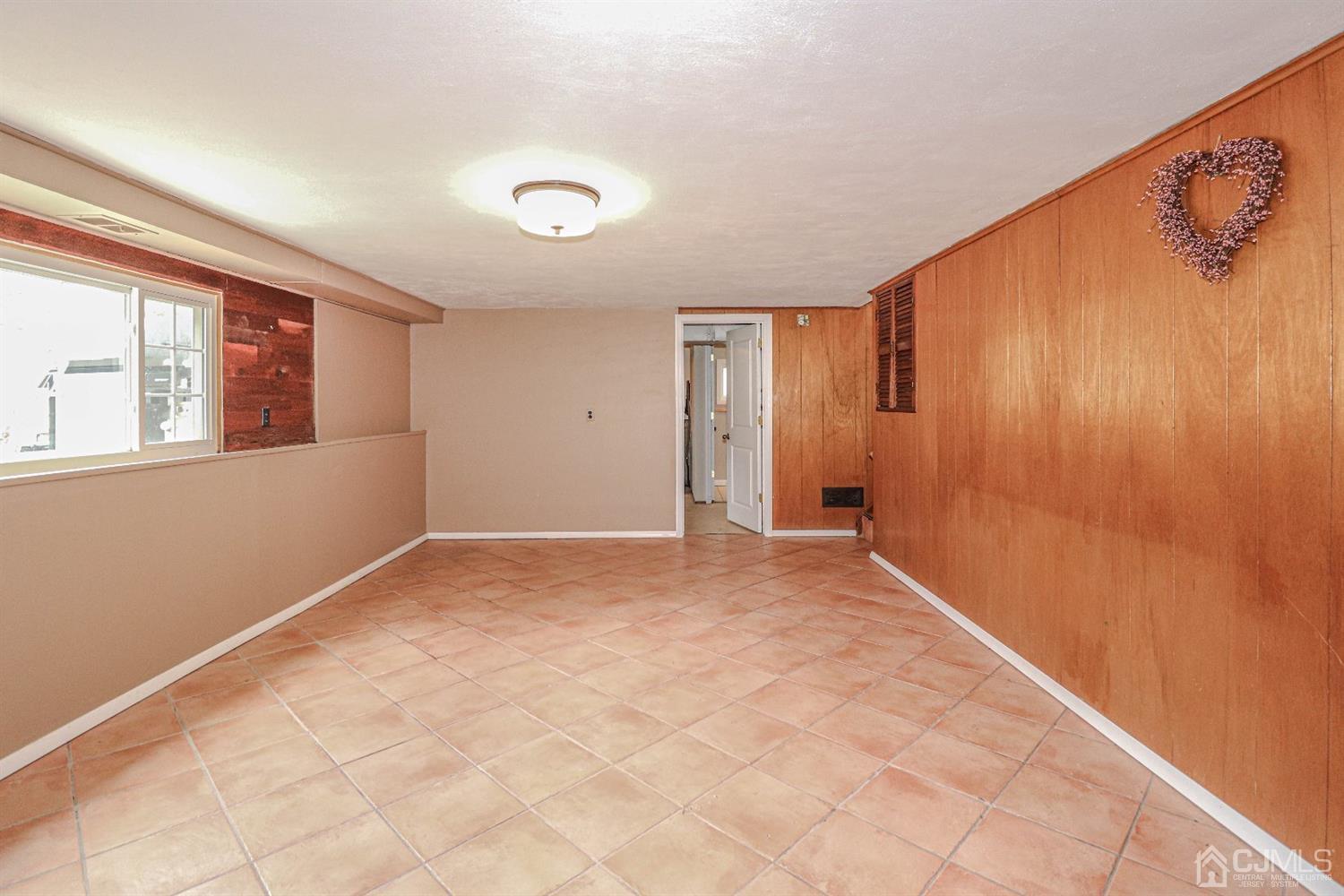 50 Albemarle Road Colonia, NJ 07067 - Photo 14 of 22 a view of an empty room with a window