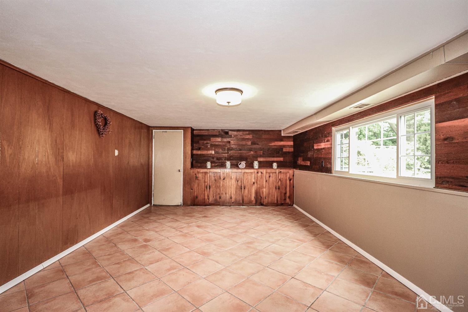 50 Albemarle Road Colonia, NJ 07067 - Photo 16 of 22 a view of an empty room with a window