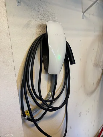 a view of staircase with a washer and dryer