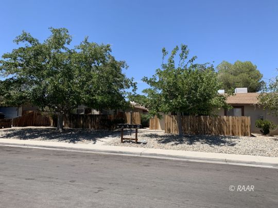 840 Commercial Avenue Ridgecrest, CA 93555 - Photo 4 of 6 a view of street with a house in the background