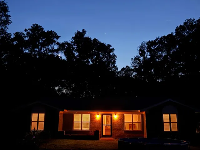 a house view with a garden space