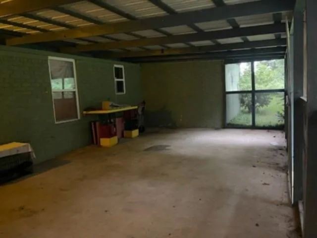 a view of a room with a large window