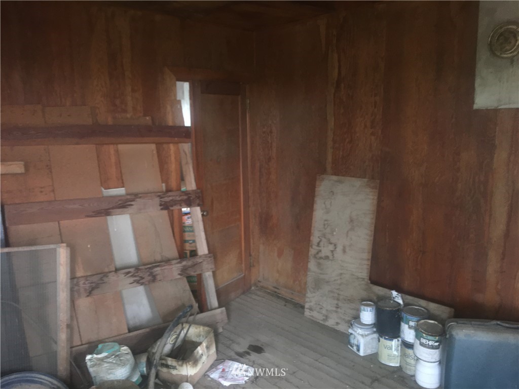 509 East Hatton Road Lind, WA 99341 - Photo 22 of 36 a view of empty room with wooden floor