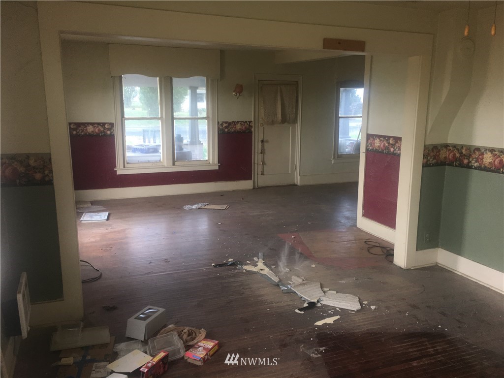 509 East Hatton Road Lind, WA 99341 - Photo 4 of 36 a view of empty room with windows