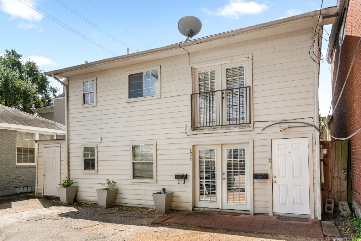 2402 Hazard Street Houston, TX 77019 - Photo 3 of 41 a front view of a house with garage