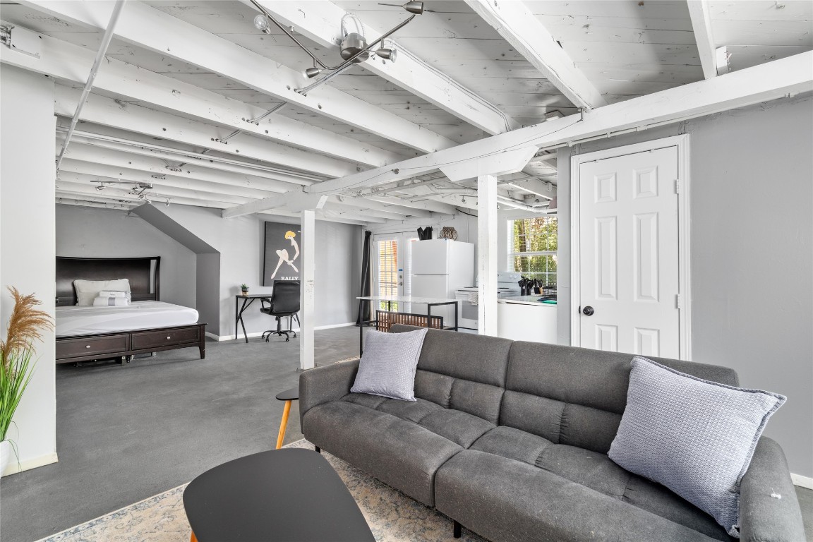 2402 Hazard Street Houston, TX 77019 - Photo 33 of 41 a living room with furniture and a fireplace