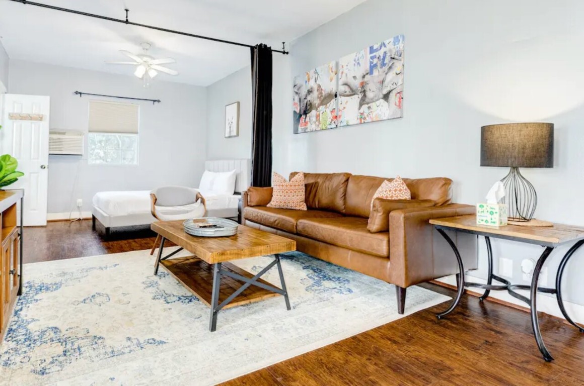 2402 Hazard Street Houston, TX 77019 - Photo 36 of 41 a living room with furniture and a rug