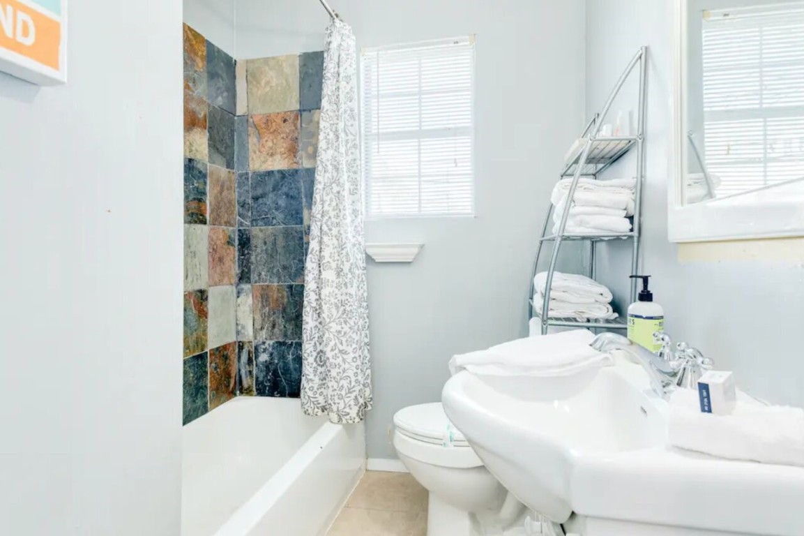 2402 Hazard Street Houston, TX 77019 - Photo 40 of 41 a bathroom with a sink toilet and shower