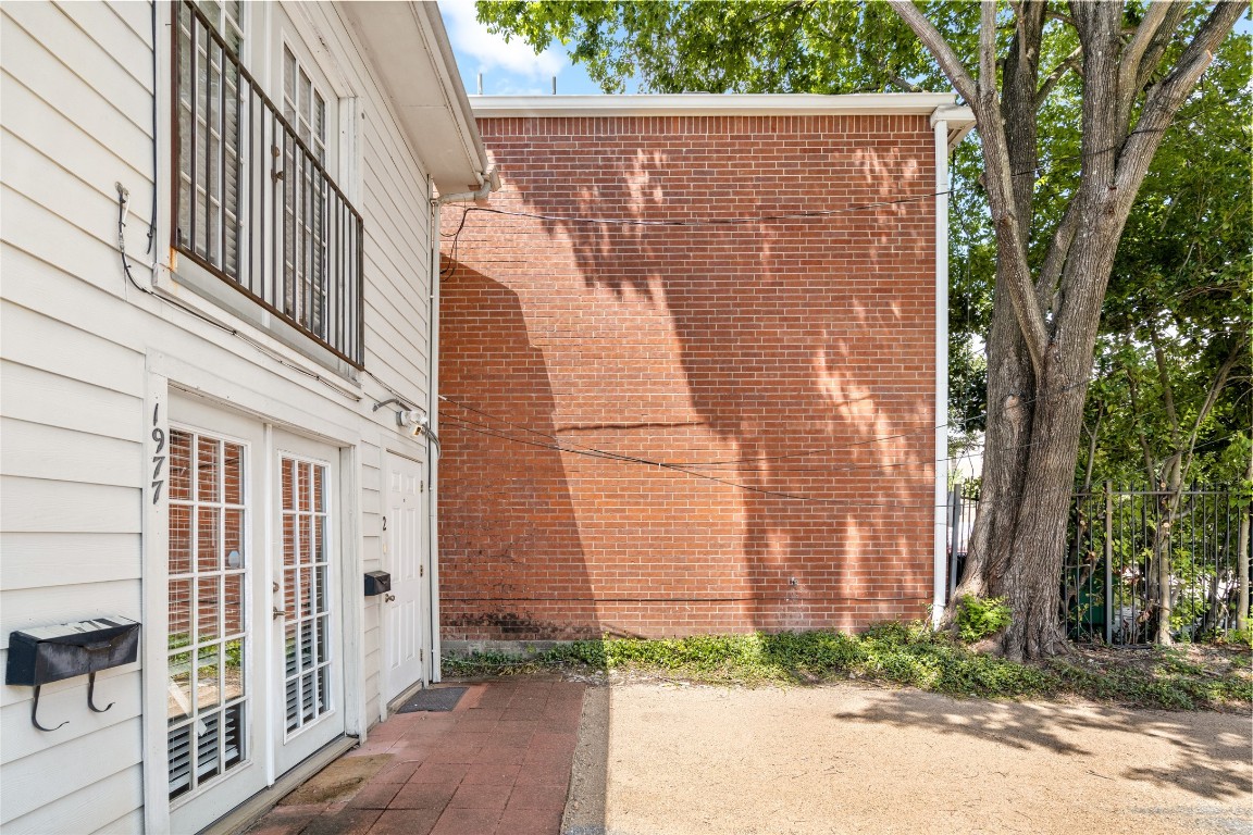2402 Hazard Street Houston, TX 77019 - Photo 4 of 41 a view of a building with a street