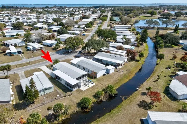an aerial view of a city with lots of residential buildings