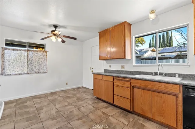 a bathroom with a sink double vanity and a mirror
