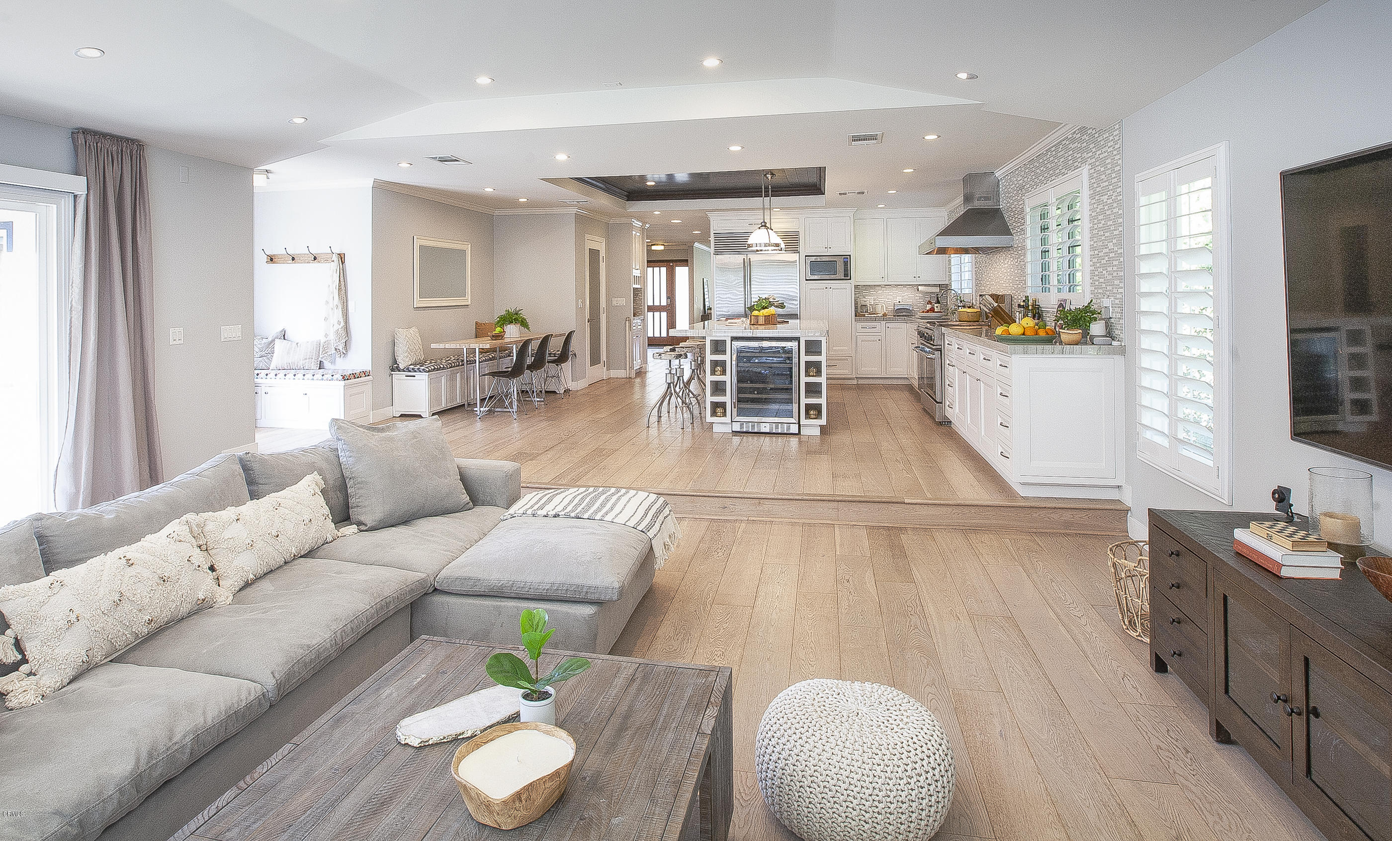 3710 Hampton Road Pasadena, CA 91107 - Photo 12 of 42 a living room with furniture and a dining table with wooden floor
