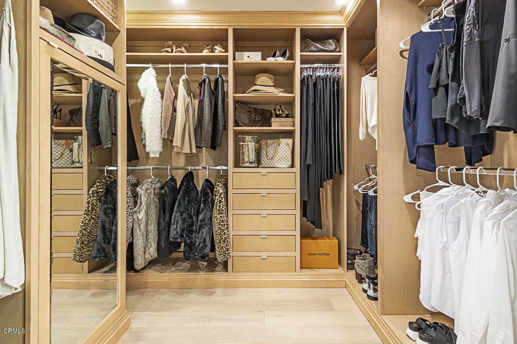 3710 Hampton Road Pasadena, CA 91107 - Photo 25 of 42 a view of walk in closet with clothes and shoes