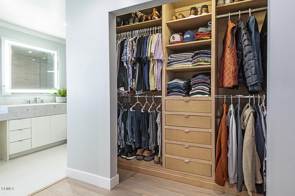 3710 Hampton Road Pasadena, CA 91107 - Photo 26 of 42 a view of walk in closet with clothes and shoes