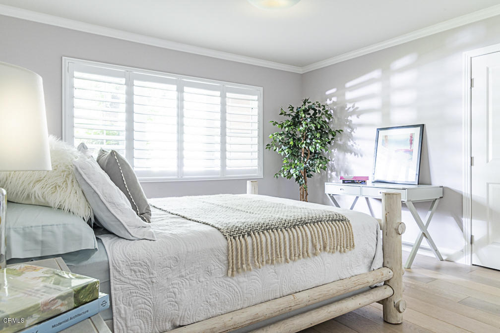 3710 Hampton Road Pasadena, CA 91107 - Photo 30 of 42 a bedroom with a bed and a large window