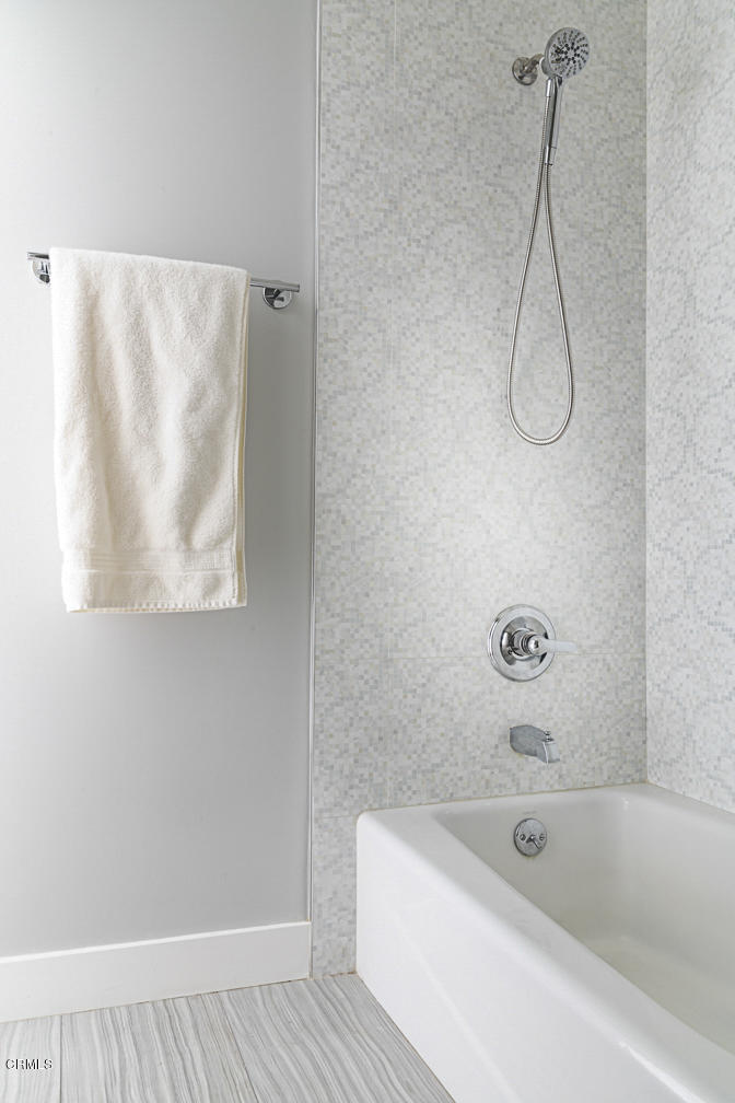 3710 Hampton Road Pasadena, CA 91107 - Photo 31 of 42 a bathroom with a bath tub and a shower