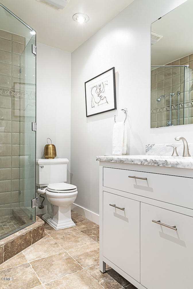 3710 Hampton Road Pasadena, CA 91107 - Photo 32 of 42 a bathroom with a toilet sink and shower