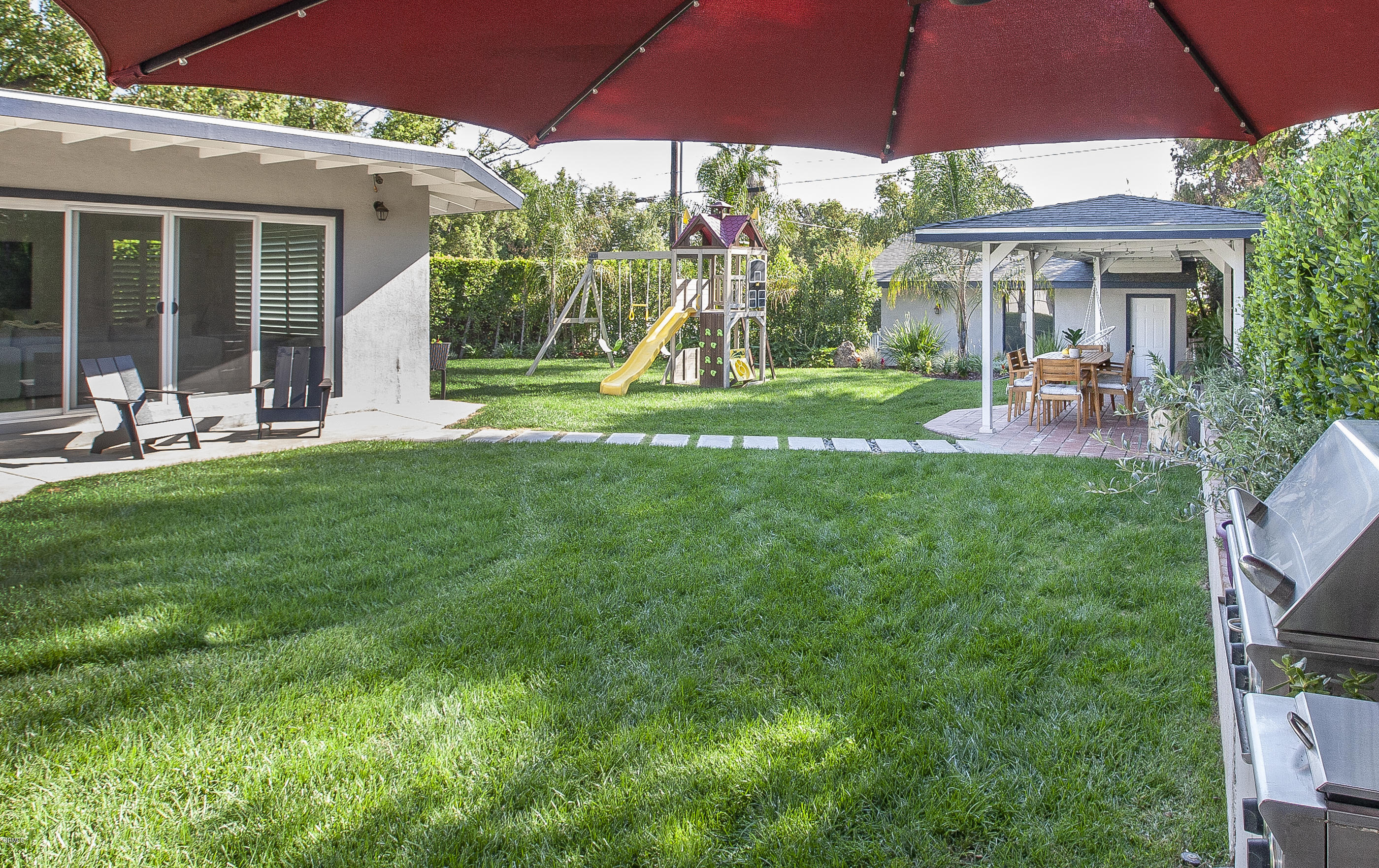 3710 Hampton Road Pasadena, CA 91107 - Photo 34 of 42 a view of a house with backyard sitting area and garden