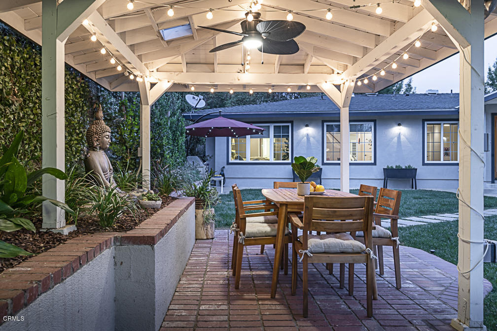 3710 Hampton Road Pasadena, CA 91107 - Photo 37 of 42 a view of a patio with a table and chairs
